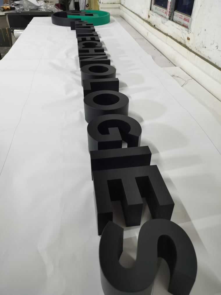 3D letters being finished in the workshop – CADMAP, Delhi