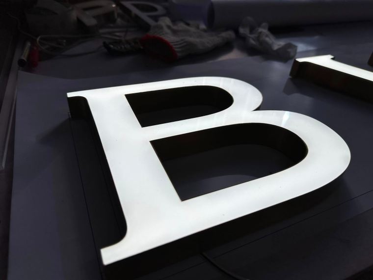 Close-up of an acrylic channel letter – CADMAP, Delhi