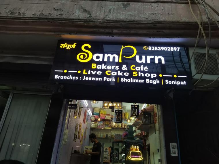 LED sign board for a bakery at night – CADMAP, Delhi