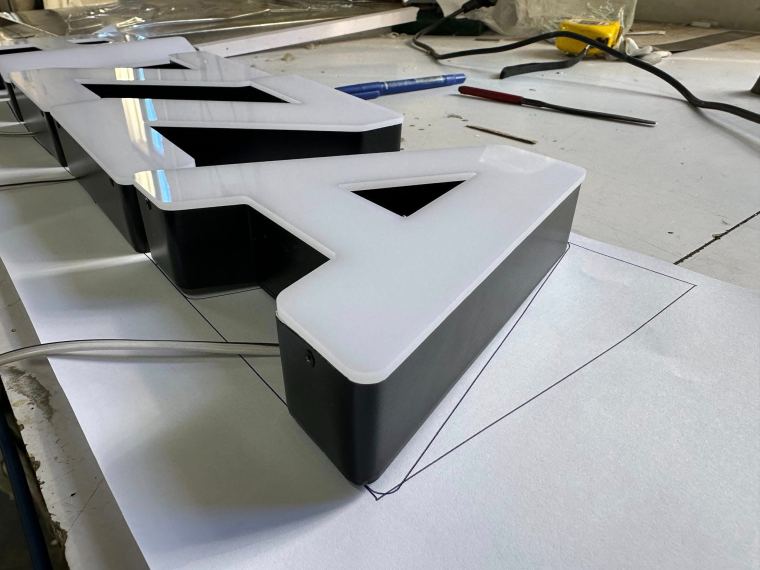 Channel letters being assembled in the CADMAP signage workshop