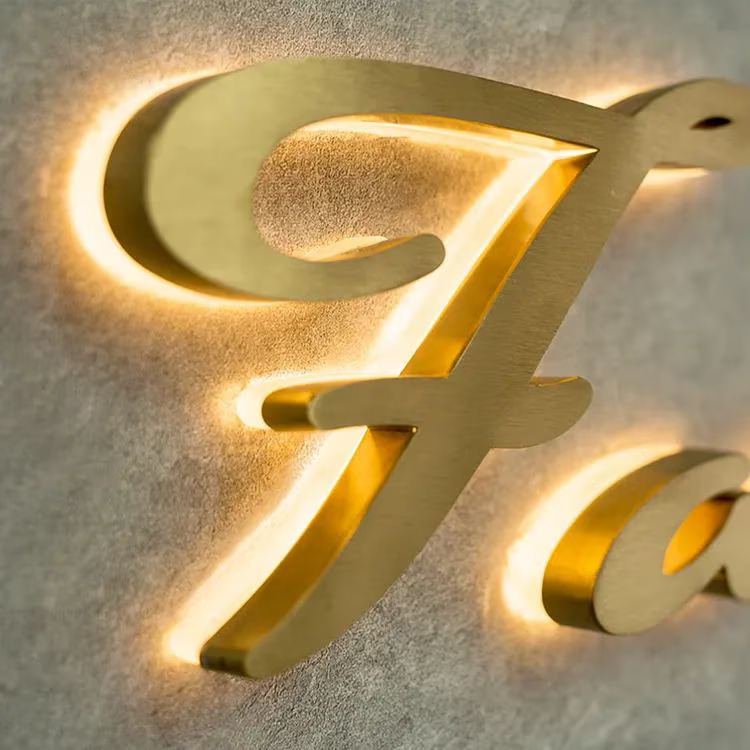 Gold halo-lit 3D letters crafted by CADMAP