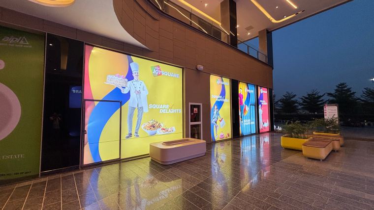Lit storefront glazing in a mall – CADMAP, Delhi