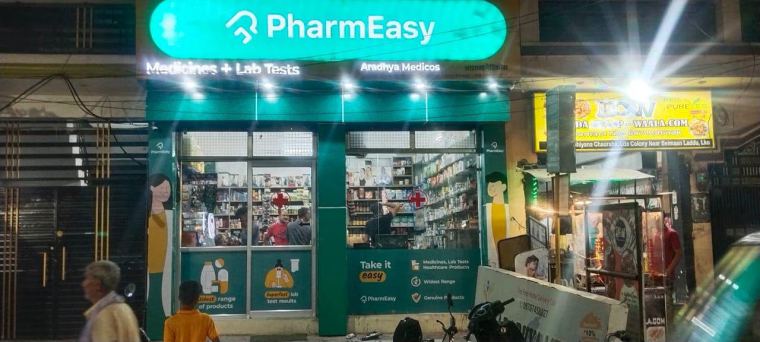 Retail storefront LED signage at night – CADMAP, Delhi