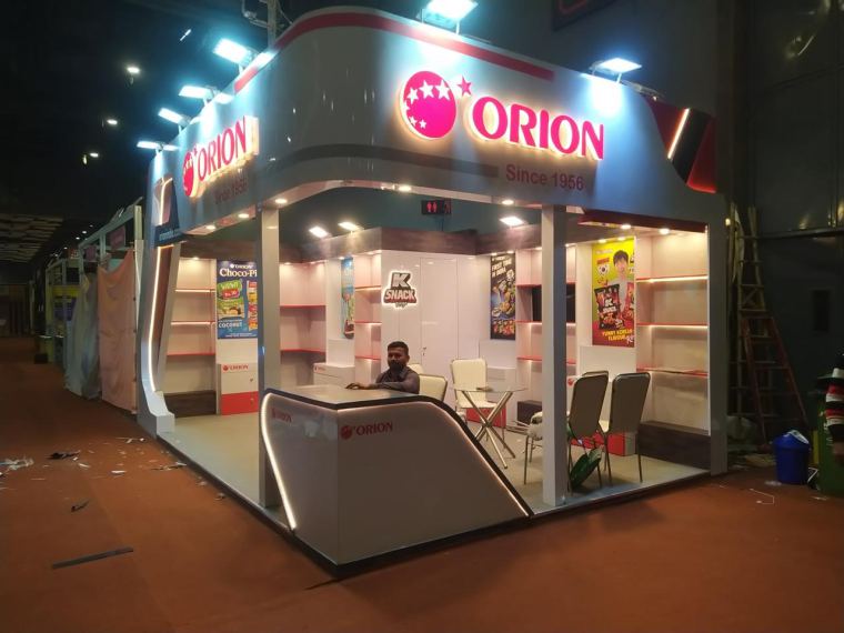 Illuminated shop-in-shop display at night – CADMAP, Delhi